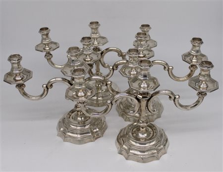 Quattro candelabri in argento