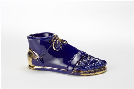 Piero Fornasetti "Piede"
Scultura in vitrus china parzialmente dorata raffiguran