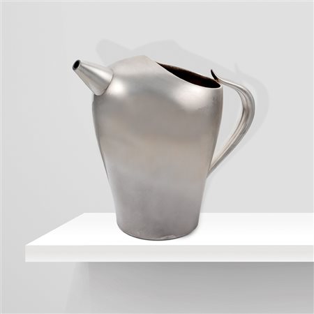 PomellatoItalia, 1970 circa19x22 cm.caraffa in argento titolo 925, interno in...