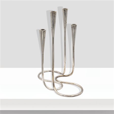 Manifattura danese (2)anni 70-80h. 26 cm.coppia di candelabri in metallo...