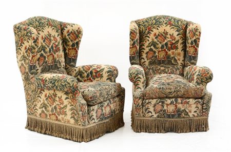 Coppia di bergère su rotelle rivestite in tessuto a fiori. Italia, anni '60/'70