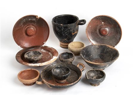 Group of Twelve Etruscan, Apulian and Campanian Black-Glazed Vessels, 4th - 3rd century BC; height max cm 14, diam. max cm 19