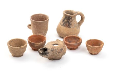 Group of Seven Etruscan, Campanian and Roman Small Vessels, 4th - 2nd century BC; height max cm 7,2 - min cm 2,5; diam. max cm 5,5 - min cm 4; lenght cm 8