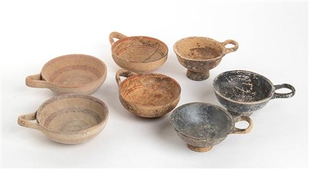 Group of Seven Daunian and Apulian Handled Bowls, 5th - 3rd century BC; height max cm 9,7 - min cm 8