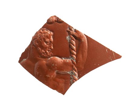 Roman Arretine Ware Fragment with Herakles, 1st century BC - 1st century AD; length max cm 4,2. 