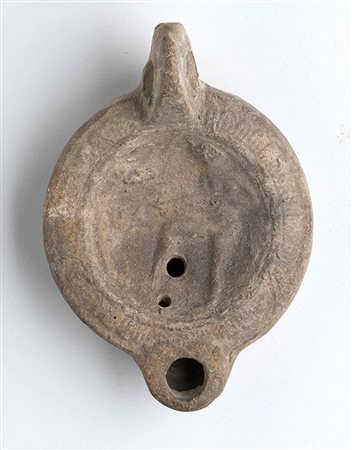 Roman Oil Lamp with Meleager and the Calydonian Boar, 1st - 2nd century AD; height cm 4,5, length cm 11