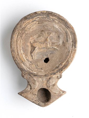 Roman Oil Lamp with Running Deer, 1st - 2nd century AD; height cm 2,5, length cm 9,8