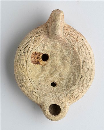 Roman Oil Lamp with Horseman, 1st - 2nd century AD; height cm 4,7, length cm 11,5