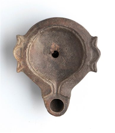 Roman Oil Lamp, 1st - 2nd century AD; height cm 3, length cm 9,5