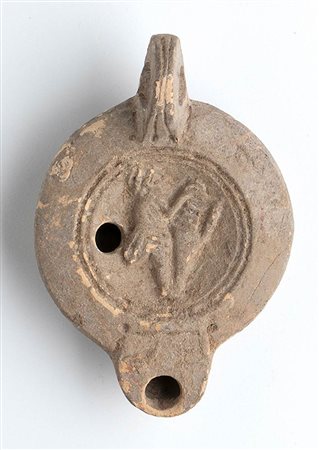 Roman Oil Lamp with Amphora Carrier, 1st - 2nd century AD; height cm 4,5, length cm 10,5