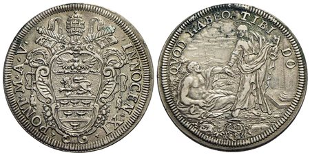 ROMA - Innocenzo XI (1676-1689) - Testone - A. V - Stemma ovale in cornice - R/ San Pietro aiuta uno