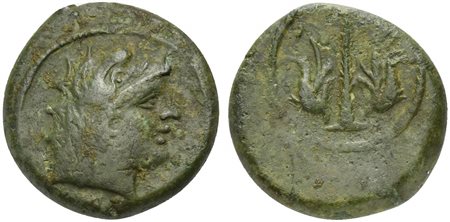 Etruria, Vetulonia, Sextans, 3rd century BC. AE (g 5,07: mm 12; h 2). Male head r., wearing ketos head-dress, Rv. ornamental trident between two dolphins. HNItaly 204; Vecchi IV.16. Very rare. Untouched green patina and about extr