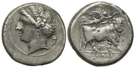 Southern Campania, Neapolis, Didrachm, ca. 275-250 BC. AR (g 7.04; mm 21; h 9). Head of nymph l.; cornucopiae behind; Rv. Man-headed bull standing r., crowned by Nike; IΣ below; NEOΠOΛIT[ΩN] in exergue. HNItaly 586; SNG BnF 856; S