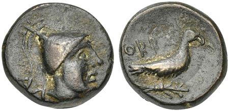 Southern Apulia, Orra, Bronze, ca. 250-225 BC. AE (g 4,74; mm 15; h 11). Head of young male r., wearing conical helmet; behind, AΛ , Rv. ORRA, eagle standing r. on thunderbolt. HNItaly 785; SNG ANS 817-9. Very rare. Green-brownish