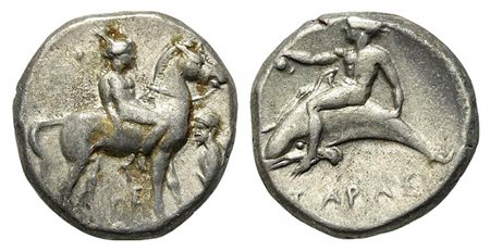Southern Apulia, Tarentum, Nomos, ca. 380-340 BC. AR (20mm, 7.97g, 2h). Nude youth on horse standing r.; to r., herm l.; HE below; Rv. Phalanthos, holding oinochoe, on dolphin l. Vlasto 408; HNItaly 873. Very fine