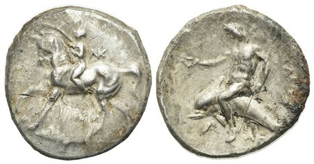 Southern Apulia, Tarentum, Nomos, ca. 280-272 BC. AR (g 5,83; mm 21; h 3). Nude youth on horse stepping l., crowning it with wreath; NK monogram to r.; Rv. TAPAΣ, Phalanthos, holding kantharos and trident, on dolphin l. Vlasto 828