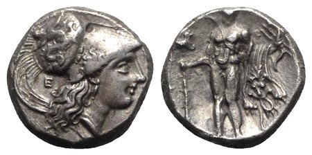 Southern Lucania, Herakleia, Stater, ca. 281-278 BC; AR (19mm, 7.82g, 4h). Head of Athena r., wearing crested Corinthian helmet decorated with Skylla hurling a stone; E behind neck. R/ Herakles standing facing, holding club and bo