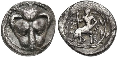 Bruttium, Rhegion, Drachm, ca. 450-445 BC. AR (g 3,93; mm 17; h 12). Lion-mask, Rv. RECI-NON, Iocastos enthroned l, holding sceptre; around laurel wreath. HNItaly 2478; SNG Copenhagen 1930; SNG ANS 646. Rare. Old cabinet tone, goo