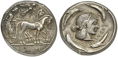 Sicily, Syracuse, Tetradrachm under the Deinomenid tyranny, ca. 485-466 BC. AR (g 17,50; mm 33; h 3). Charioteer driving slow quadriga r.; holding kentron and reins; above, Nike flying r. crowning horses, Rv. ΣVPAKOΣION, head of A