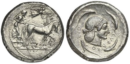 Sicily, Syracuse, Tetradrachm struck under Deinomenid Tyranny, ca. 485-479 BC. AR (g 17,06; mm 25; h 6). Charioteer driving slow quadriga r.; holding kentron and reins; above, Nike flying r., crowning horses, Rv. ΣVPAKO - ΣIO - N,