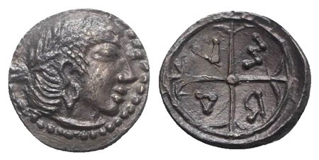 Sicily, Syracuse, Litra struck under Deinomenid Tyranny, ca. 485-479 BC. AR (g 0,56; mm 9; h 3). Head of Arethusa r.; Rv. Wheel with four spokes; Σ-Y-R-A (retrograde) between. Cf. Boehringer 392-405; cf. SNG ANS 124-6. Dark patina