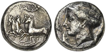 Sicily, Syracuse, Tetradrachm struck under the Second Democracy, signed by Eukleidas, ca. 466-405 BC. AR (g 16,45; mm 23; h 5). Charioteer driving fast quadriga l.; above, Nike flying right crowning charioteer; in ex. grain ear, R