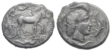 Sicily, Syracuse, Tetradrachm, ca. 450-440 BC BC. AR (27mm, 16.94g, 12h). Charioteer driving quadriga r.; above, Nike flying r., crowning horses; in exergue, ketos r.; Rv. ΣVPAKOΣION, Head of Arethousa r., hair in thin band; four 