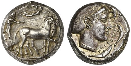 Sicily, Syracuse, Tetradrachm struck under the Second Democracy, ca. 430 BC. AR (g 17,50; mm 22; h 3). Charioteer driving slow quadriga r.; holding kentron and reins; above, Nike flying r., crowning horses, Rv. ΣVPAKOΣION, head of