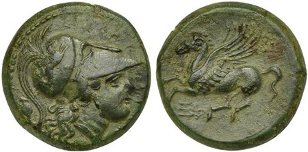 Sicily, Syracuse, Bronze struck under Agathokles, ca. 317-289 BC. AE (g 10,82; mm 22; h 1). ΣYPAKOΣIΩN, helmeted head of Athena r.; behind, palladium, Rv. Pegasos flying l., below, trident prongs. CNS 115. Green patina and about e