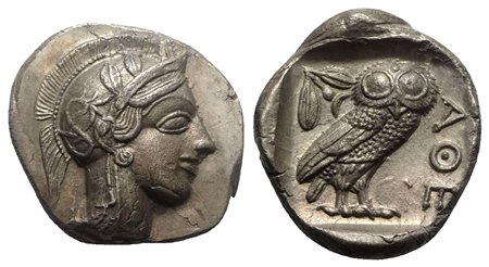 Attica, Athens, Tetradrachm, ca. 454-404 BC. AR (g 17,28; mm 27; h 8). Helmeted head of Athena r.; Rv. AΘE, Owl standing r., head facing; olive sprig behind; all within incuse square. Kroll 8; SNG Copenhagen 31. Well centered, ext