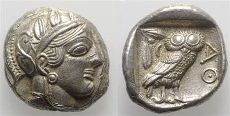Attica, Athens, Tetradrachm, ca. 454-404 BC. AR (g 17,03; mm 24,5; h 7). Helmeted head of Athena r.; Rv. AΘE, Owl standing r., head facing; olive sprig behind; all within incuse square. Kroll 8; SNG Copenhagen 31. Extremely fine