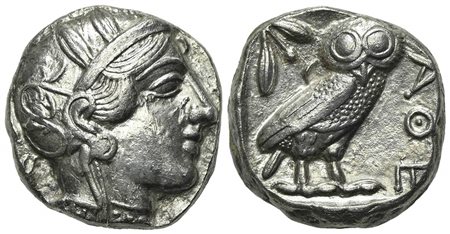 Attica, Athens, Tetradrachm, ca. 454-404 BC. AR (g 16,86; mm 22; h 9). Helmeted head of Athena r.; Rv. AΘE, Owl standing r., head facing; olive sprig behind; all within incuse square. Kroll 8; SNG Copenhagen 31. Nick on obv., near
