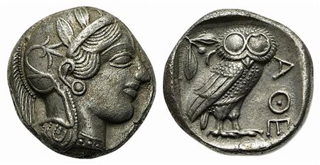 Attica, Athens, Tetradrachm, ca. 454-404 BC. AR (g 17,03; mm 22; h 9). Helmeted head of Athena r.; Rv. AΘE, Owl standing r., head facing; olive sprig behind; all within incuse square. Kroll 8; SNG Copenhagen 31. Good very fine - n