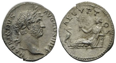Hadrian (117-138), Denarius, Rome, ca. 134-8. AR (g 3,03; mm 17; h 6). HADRIANVS AVG COS III P P, Laureate head r.; Rv. AEGYPTOS, Egypt reclining l., holding sistrum and resting arm on basket; at feet to l., ibis standing r. RIC 2