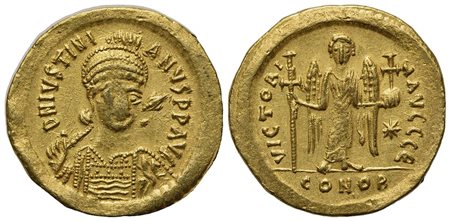 Justinian I (527-565); AV Solidus (g 4,48; mm 21; h 6); Constantinople, 527-538. Helmeted and cuirassed bust facing slightly r., holding spear and shield; Rv. Angel standing facing, holding globus cruciger and cross; star to r.; Є