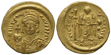 Justinian I (527-565); AV Solidus (g 4,48; mm 20,5; h 6); Constantinople, 538-545; Helmeted and cuirassed bust facing, holding globus cruciger and shield decorated with soldier on horseback riding r.; Rv. Angel standing facing, ho