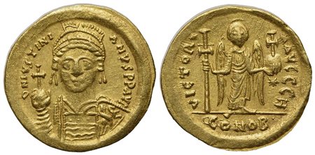 Justinian I (527-565); AV Solidus (g 4,50; mm 20,5; h 6); Constantinople, 538-545; Helmeted and cuirassed bust facing, holding globus cruciger and shield decorated with soldier on horseback riding r.; Rv. Angel standing facing, ho