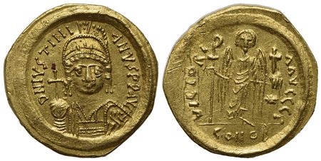 Justinian I (527-565); AV Solidus (g 4,49; mm 20; h 6); Constantinople, 545-565; Helmeted and cuirassed bust facing, holding globus cruciger and shield; Rv. Angel standing facing, holding staff terminating in Christogram and globu