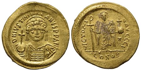 Justinian I (527-565); AV Solidus (g 4,49; mm 21; h 6); Constantinople, 545-565; Helmeted and cuirassed bust facing, holding globus cruciger and shield; Rv. Angel standing facing, holding staff terminating in Christogram and globu