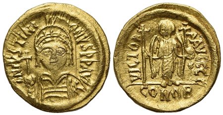Justinian I (527-565); AV Solidus (g 4,47; mm 20; h 6); Carthage, year 10 (AD 546/7); Helmeted and cuirassed bust facing, holding globus cruciger and shield decorated with soldier on horseback riding r.; Rv. Angel standing facing,