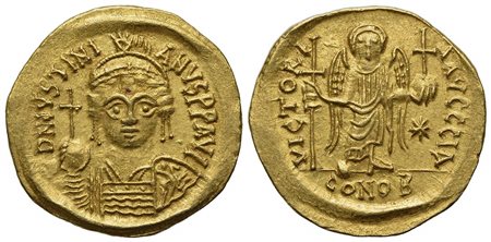 Justinian I (527-565); AV Solidus (g 4,45; mm 21; h 6); Carthage, year 11 (AD 547/8); Helmeted and cuirassed bust facing, holding globus cruciger and shield decorated with soldier on horseback riding r.; Rv. Angel standing facing,