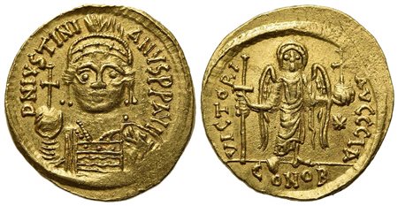 Justinian I (527-565); AV Solidus (g 4,50; mm 20; h 6); Carthage, year 11 (AD 547/8); Helmeted and cuirassed bust facing, holding globus cruciger and shield decorated with soldier on horseback riding r.; Rv. Angel standing facing,
