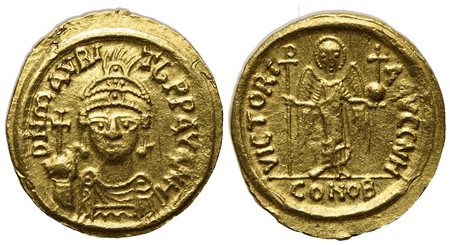Maurice Tiberius (582-602); AV Solidus (g 4,43; mm 19,5; h 6); Carthage, year 8 (589/90); Helmeted, draped and cuirassed bust facing, holding globus cruciger; Rv. Angel standing facing, holding staff terminating in staurogram and 