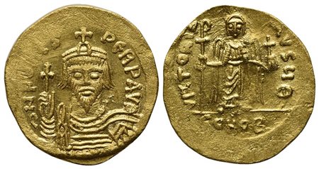 Phocas (602-610); AV Solidus (g 4,49; mm 21; h 6); Constantinople, 607-9. Crowned, draped and cuirassed facing bust, holding cross; Rv. Angel standing facing, holding globus cruciger and long staff terminating in staurogram; Θ//CO