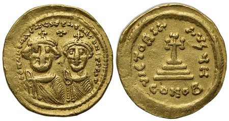 Heraclius (610-641); AV Solidus (g 4,37; mm 21; h 7); Constantinople, 625-629. Crowned facing busts of Heraclius and Heraclius Constantine; cross above; Rv. Cross potent set on three steps; H//CONOB. MIB 22b; DOC -; Sear 743. Good