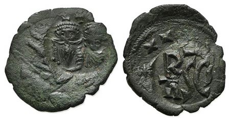Heraclius (610-641); AE 40 Nummi (g 5,08; mm 27; h 6); Syracuse, 632-641. Countermarked: crowned facing busts of Heraclius and Heraclius Constantine; cross above; Rv. Monogram and SCs. MIB pl. 18, Km 6; DOC 243; Sear 884. Very fin
