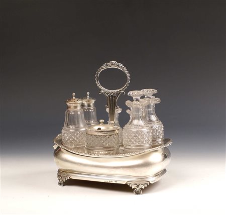 OLIERA IN ARGENTO GIORGIO IV Londra 1821 Con sette ampolle in vetro molato...