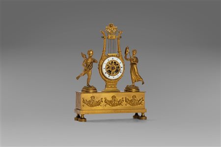 Pendola in bronzo dorato di epoca Impero