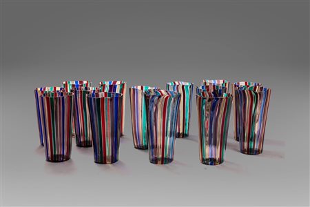 Gio Ponti (MIlano 1891-1979)  - Lotto di 14 bicchieri a canne in vetro di Murano, dal 1950 ca. al 1994