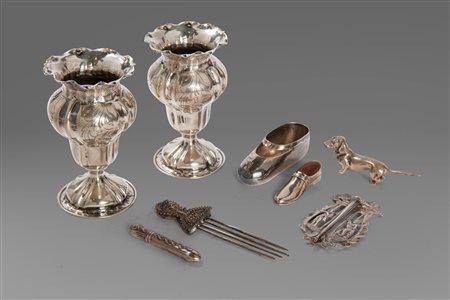 Lotto composto da 8 oggetti in argento